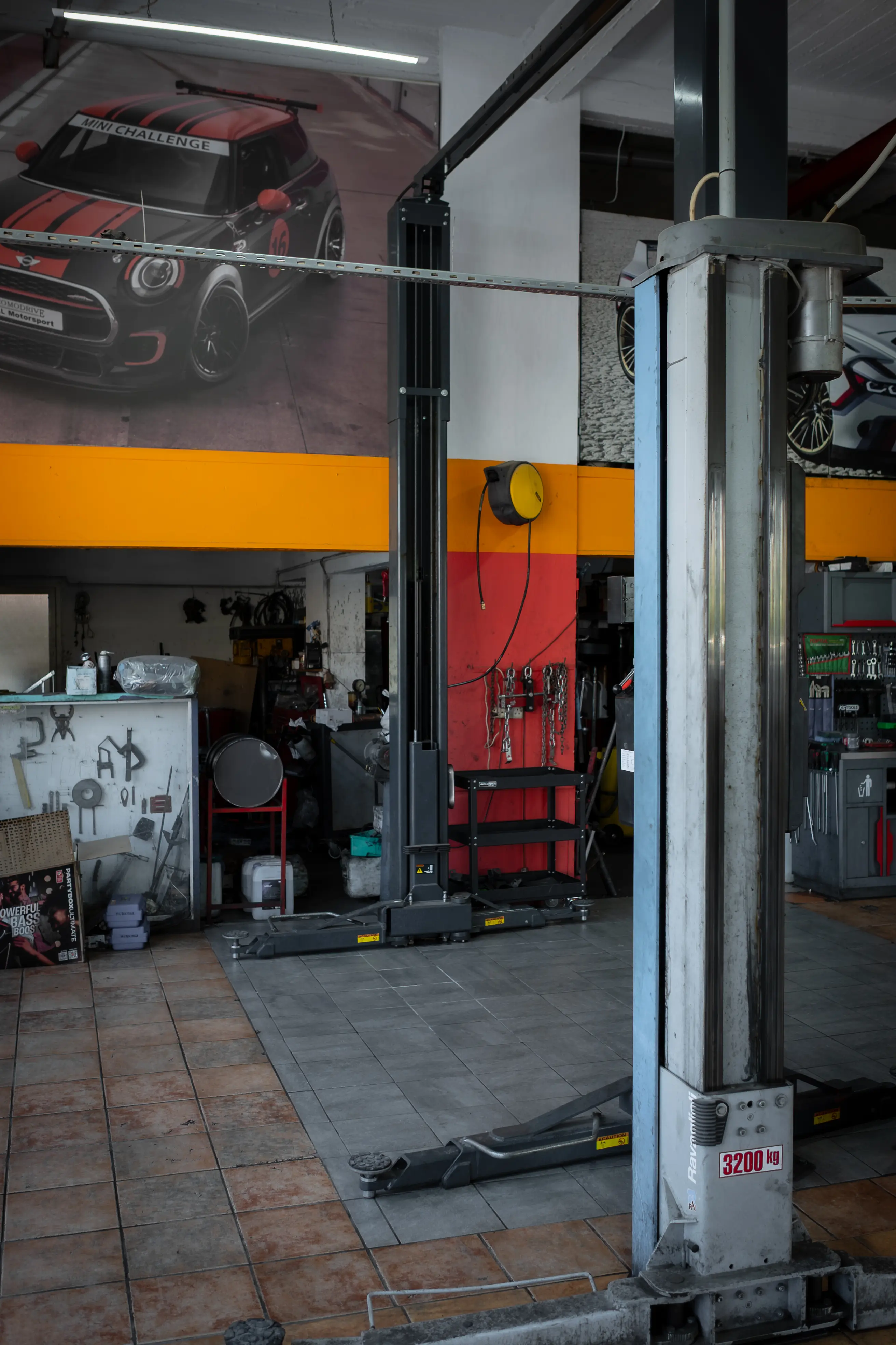 Milikouros technician working on a vehicle inside the Nicosia workshop