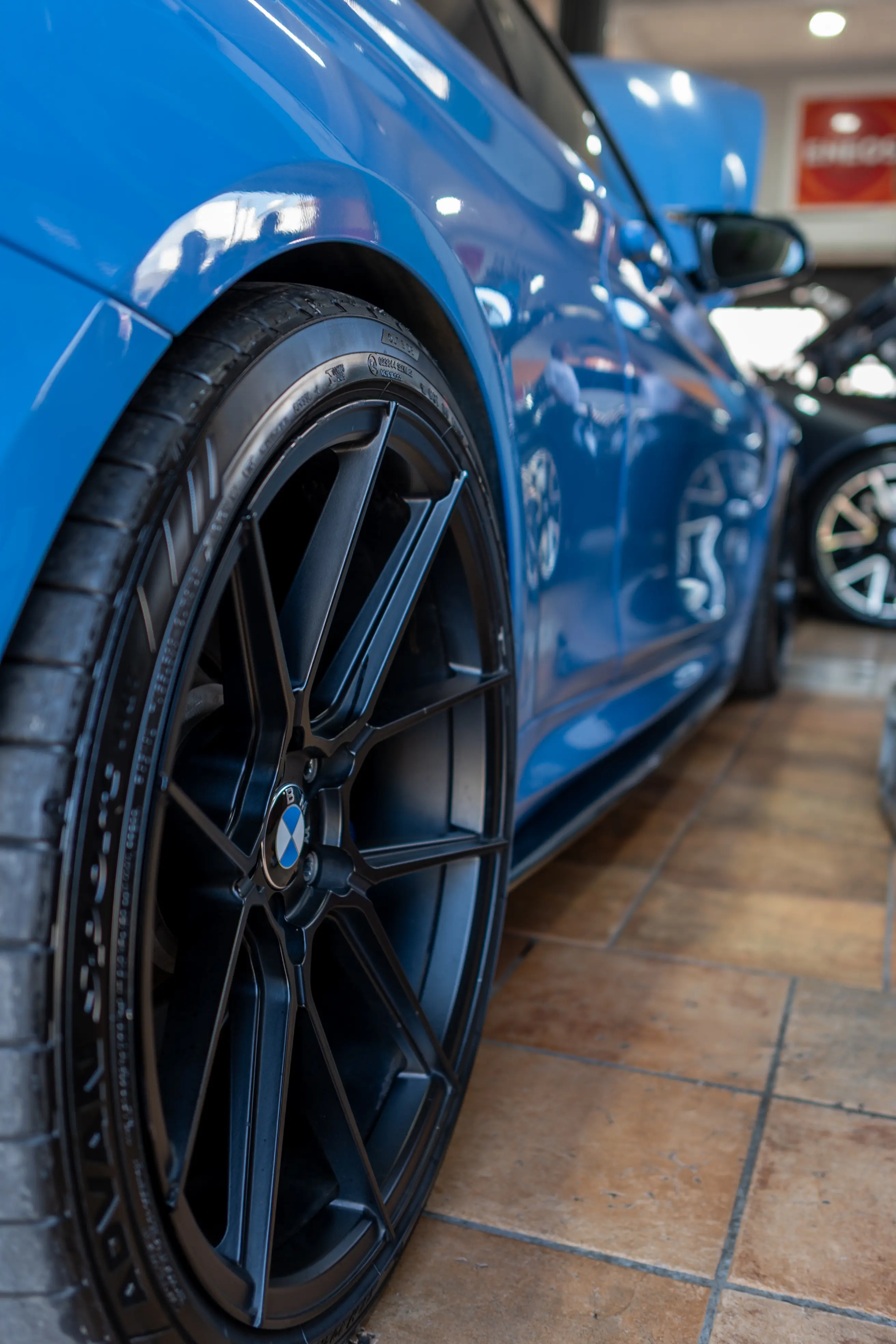 BMW M4 side profile after workshop service